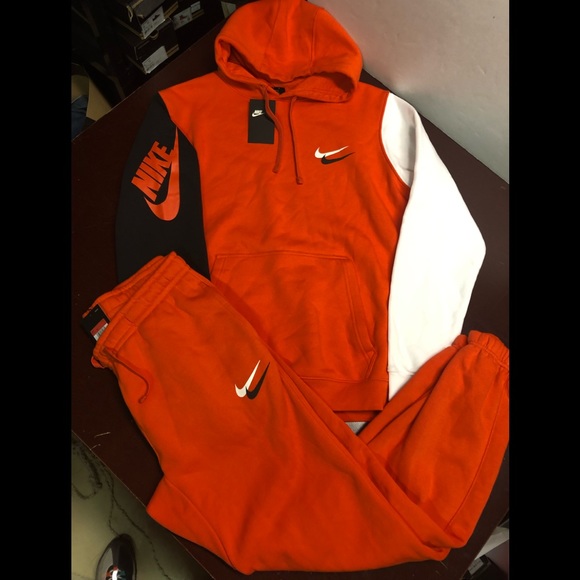 blue and orange nike jogging suit